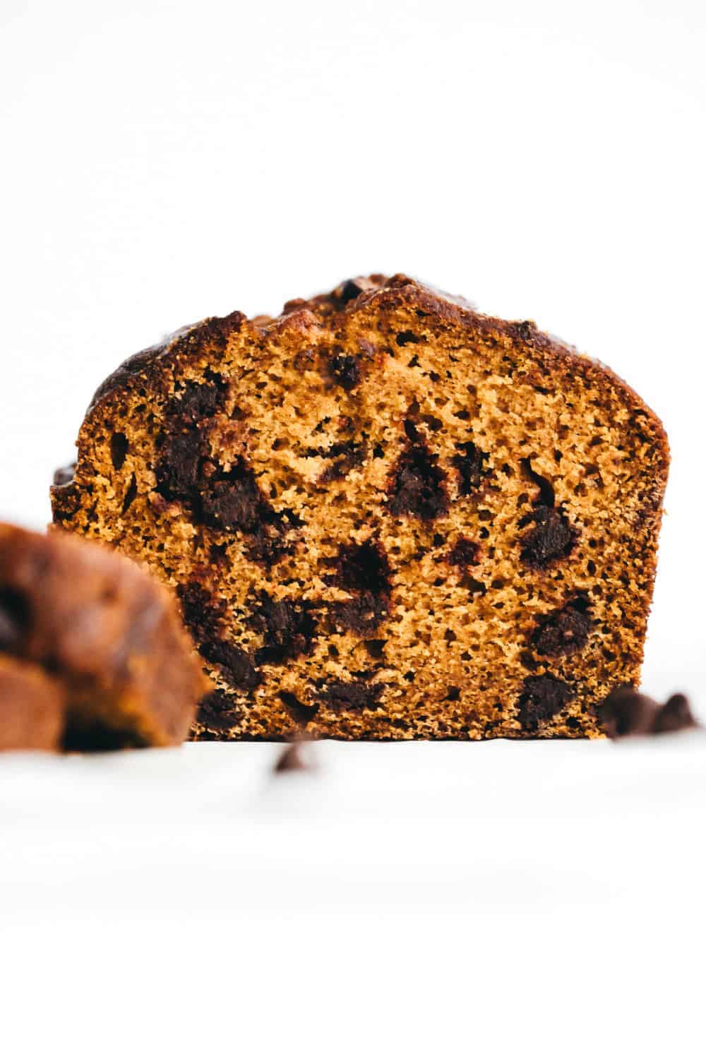 View of the inside of a loaf of pumpkin chocolate chip bread