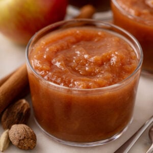 Small glass bowl of crockpot applesauce.