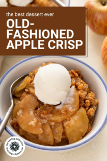 Apple crisp topped with a scoop of ice cream in a bowl. Text overlay includes recipe name.