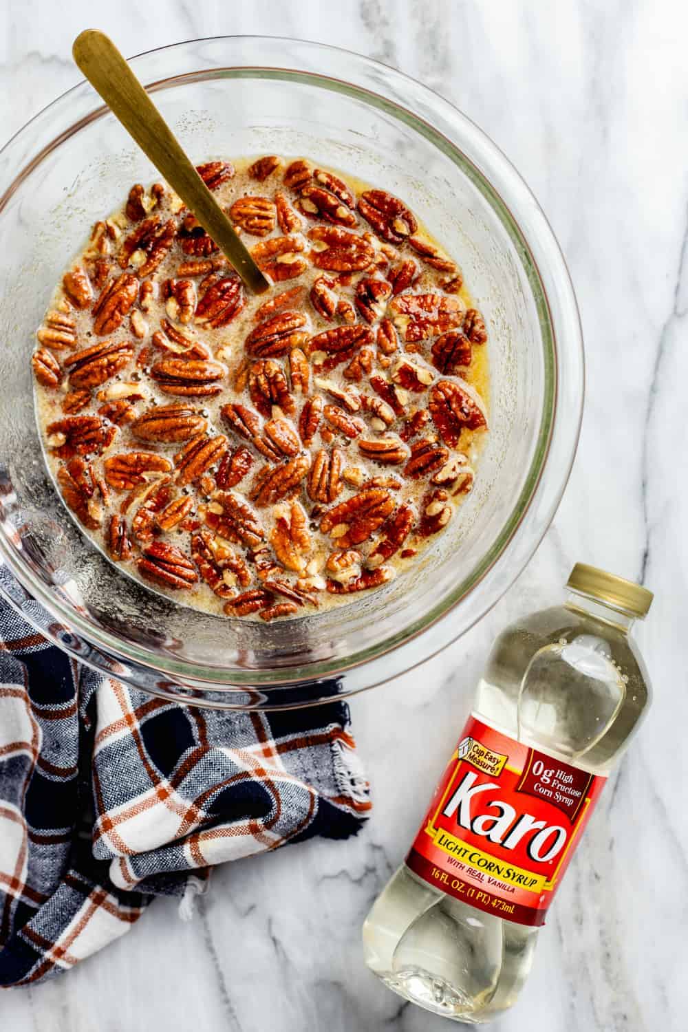 Filling for pecan pie in a glass mixing bowl