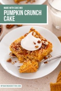 Fork cutting bite from a slice of pumpkin crunch cake on a white plate. Text overlay includes recipe name.