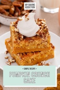 White plate holding two slices of stacked pumpkin crunch cake, topped with a dollop of whipped cream. Text overlay includes recipe name.