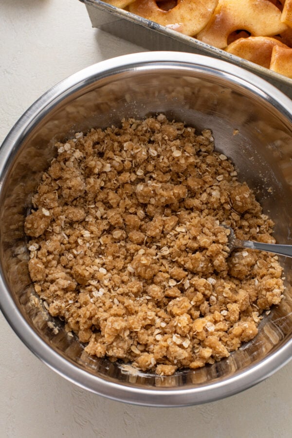 Crisp topping mixed in a metal bowl.
