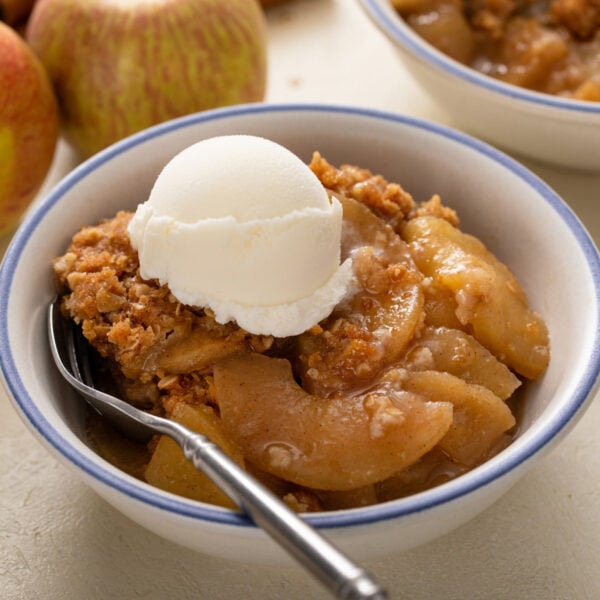 Serving of old-fashioned apple crisp in a bowl.