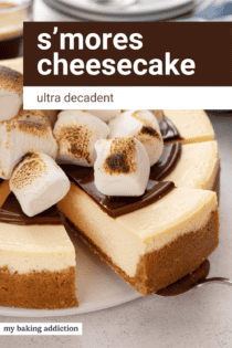 Cake server lifting a slice of s'mores cheesecake from a cake plate. Text overlay includes recipe name.