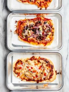 Assorted pizzas made with 30 minute pizza crust on mini baking sheets
