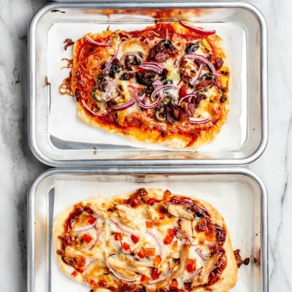 Assorted pizzas made with 30 minute pizza crust on mini baking sheets