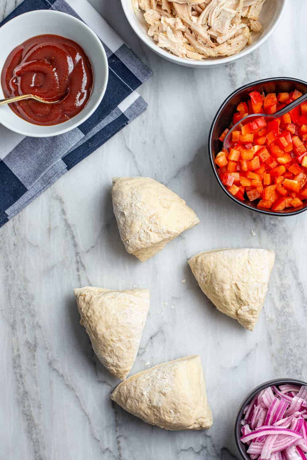 30 minute pizza crust recipe divided into 4 portions for a homemade pizza bar