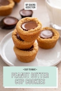 Three peanut butter cup cookies stacked on a white plate in front of a glass of milk. Text overlay includes recipe name.