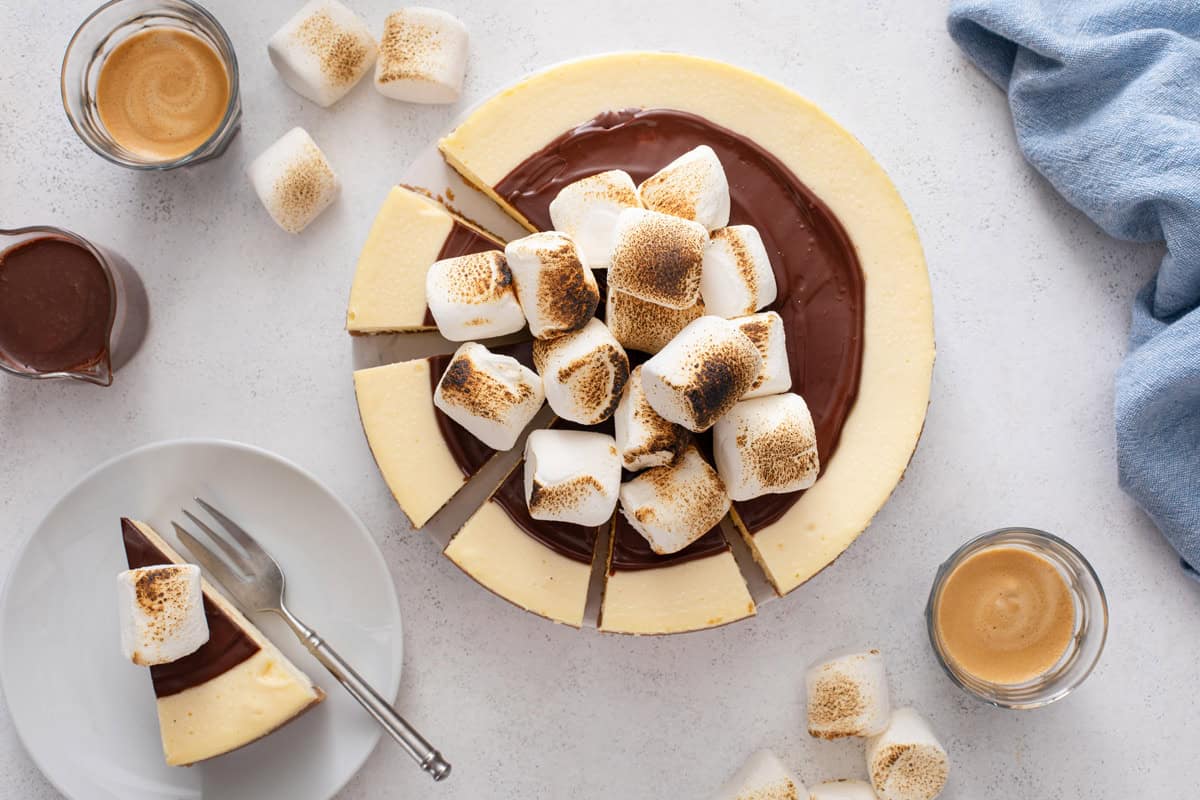 Overhead view of sliced s'mores cheesecake.