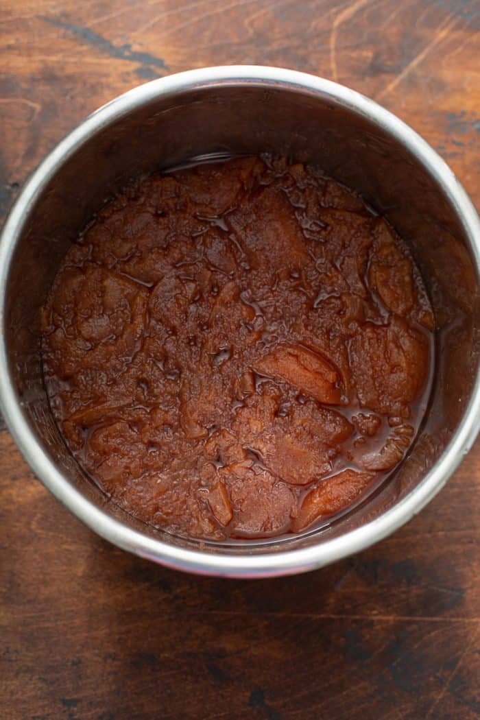 Overhead view of cooked apple butter in the bowl of an Instant Pot, ready to be pureed