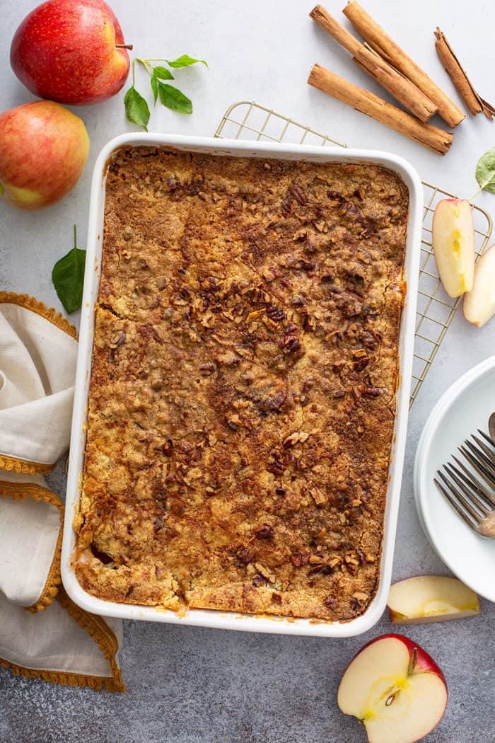 Overhead view of baked apple dump cake in a white cake pan