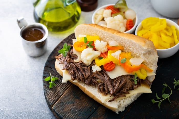 Italian beef sandwich on a wooden board