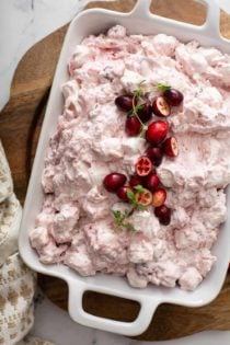 Overhead view of cranberry fluff in a white serving dish