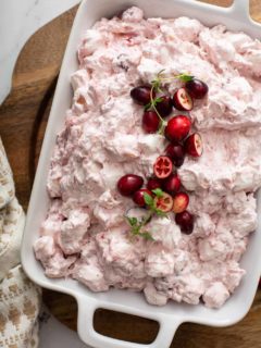 Overhead view of cranberry fluff in a white serving dish