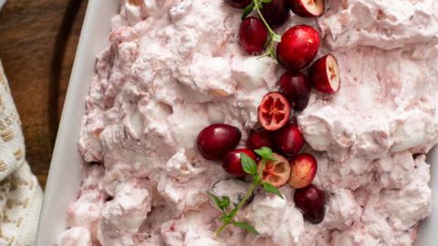 Overhead view of cranberry fluff in a white serving dish