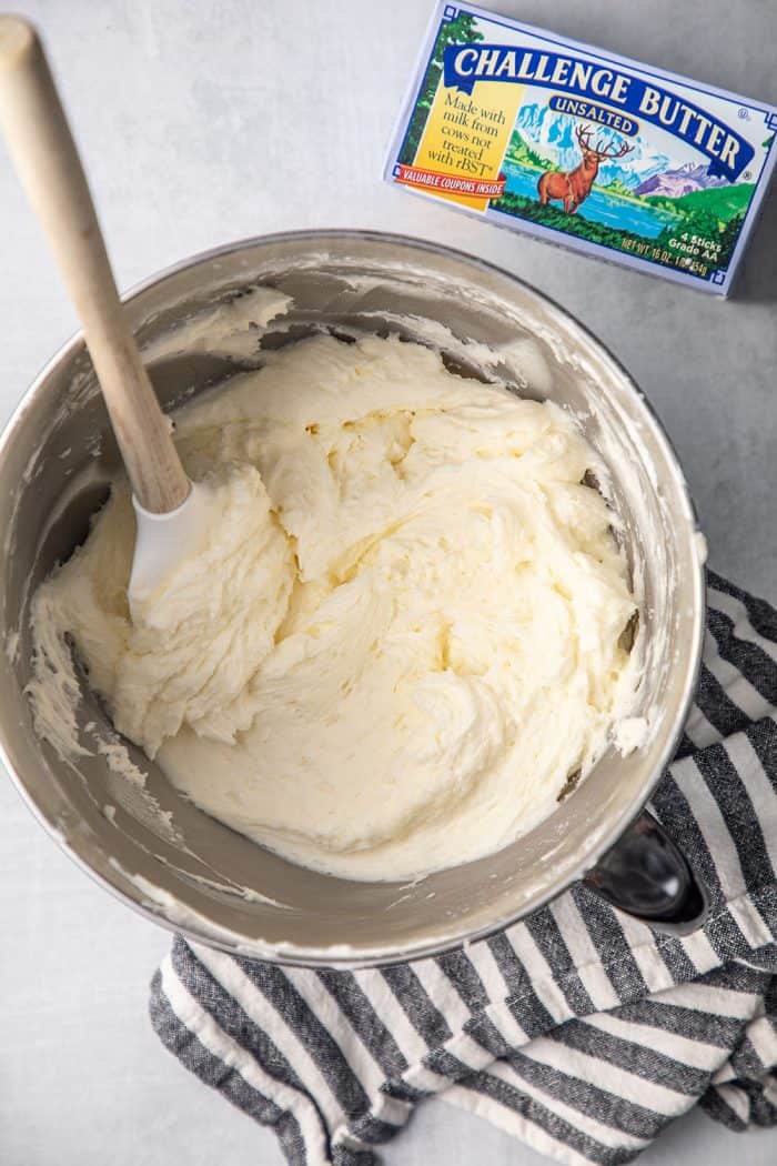 Mixing bowl full of white buttercream frosting