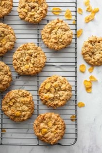 Cornflake cookies cooling on a wire rack