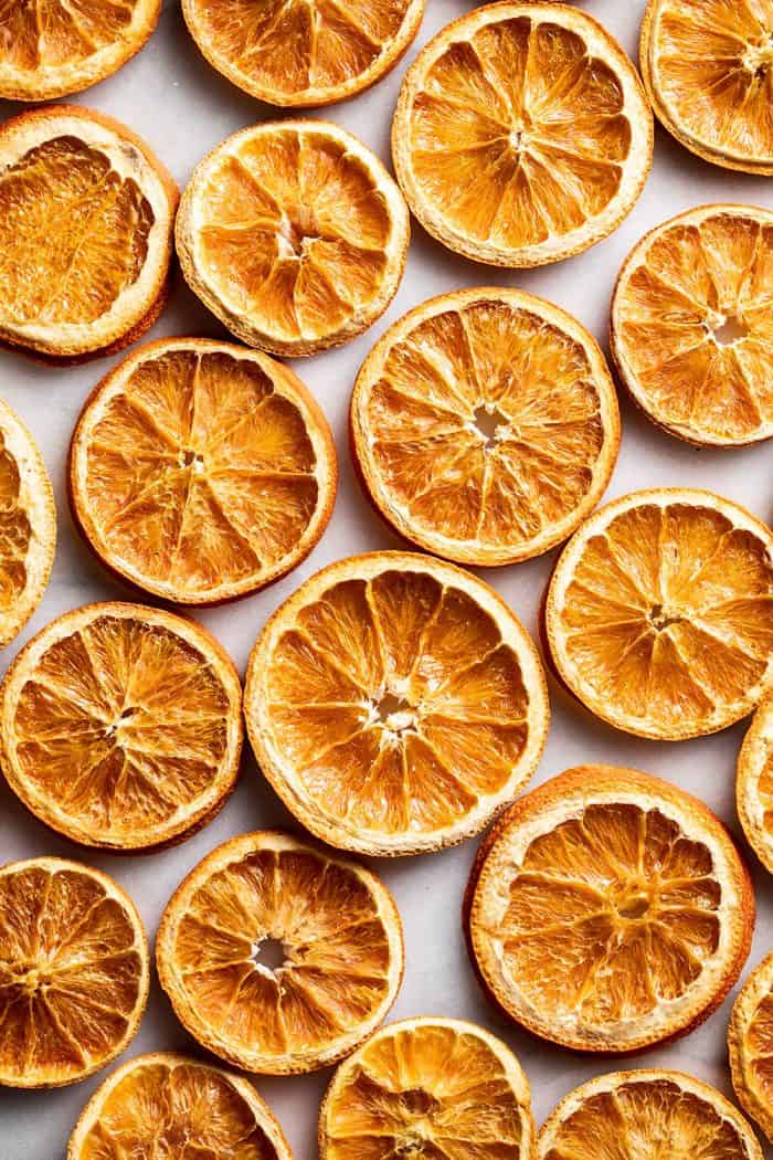 Dried oranges laid out on a countertop