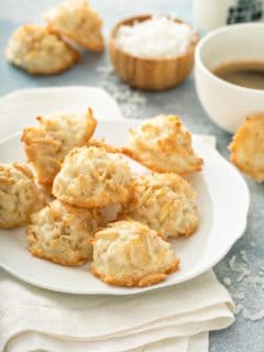Coconut and almond macaroons arranged on a white plate