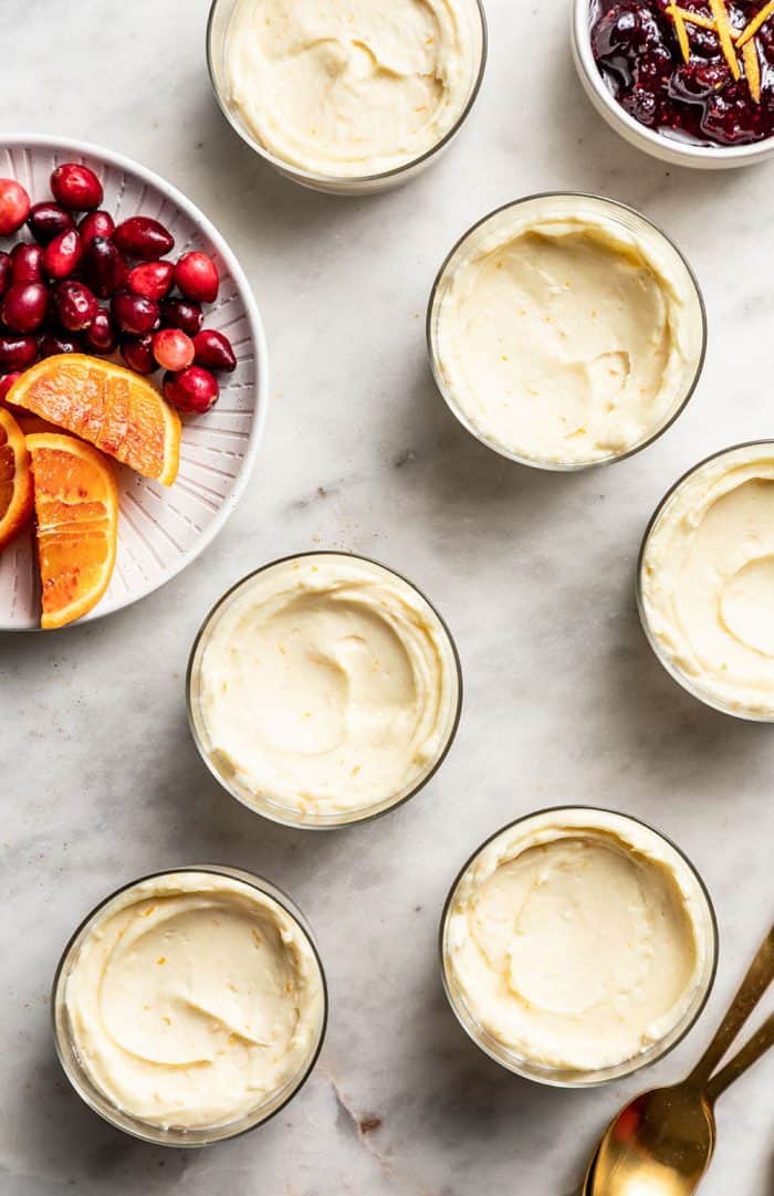 Mini no-bake cheesecakes on a marble counter