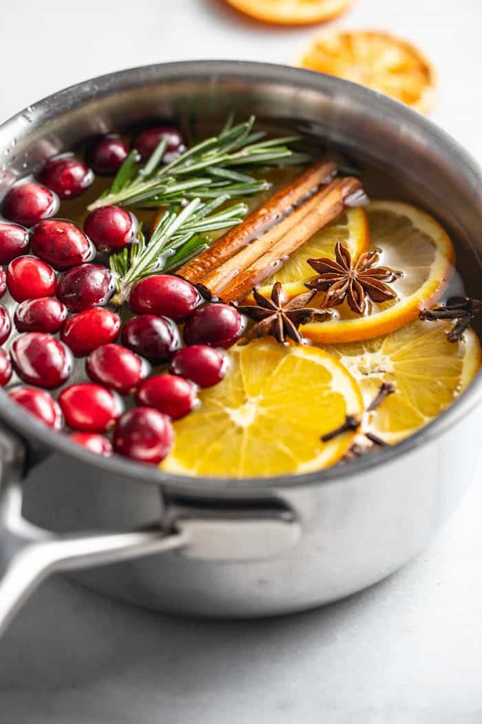 Stovetop potpourri simmering in a saucepan of water