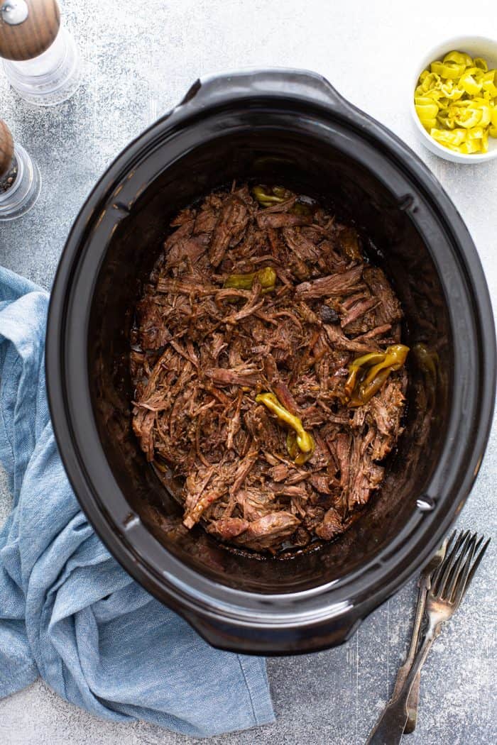 Shredded mississippi roast in a crock pot