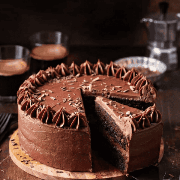 Slice being removed from a chocolate layer cake