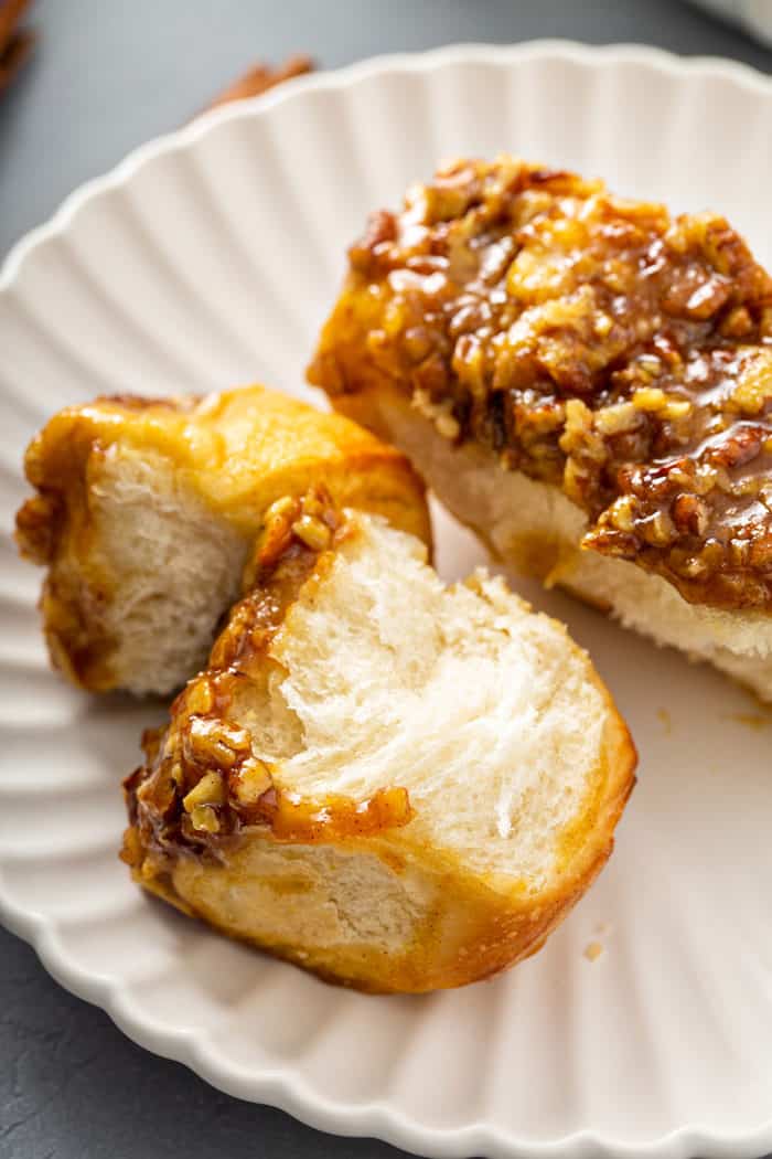 Pecan sticky buns on a white plate