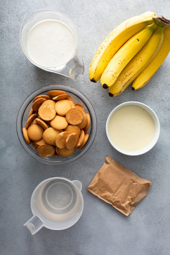 Ingredients for Magnolia Banana Pudding arranged on a gray countertop