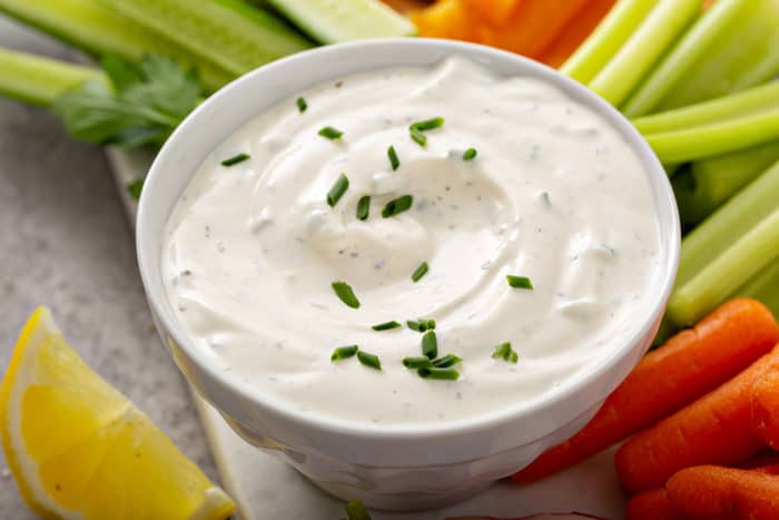 Close up of homemade ranch dip in a white bowl