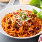 Bowl of one-pot spaghetti on a gray countertop