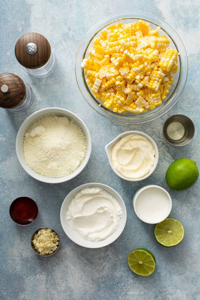 Ingredients for Mexican street corn salad arranged on a countertop