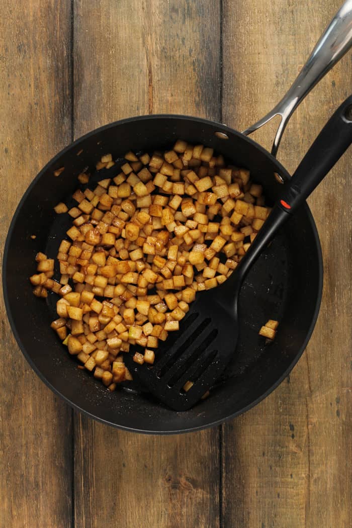 Cooked apple turnover filling in a skillet