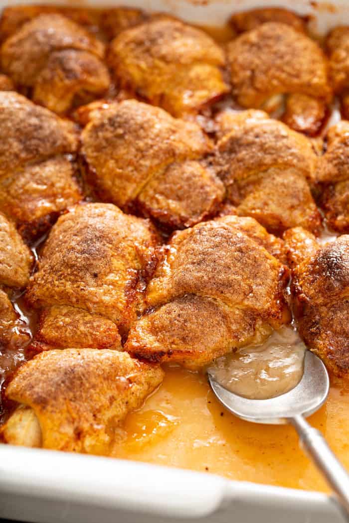 Spoon in a pan of easy apple dumplings