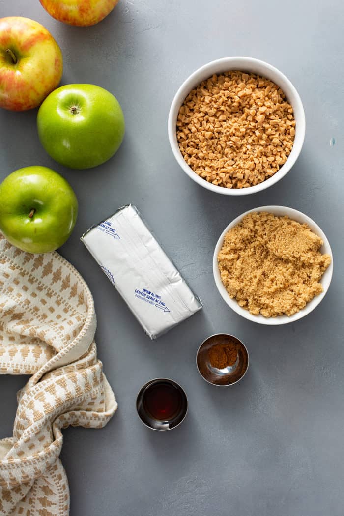 Ingredients for toffee apple dip arranged on a gray countertop