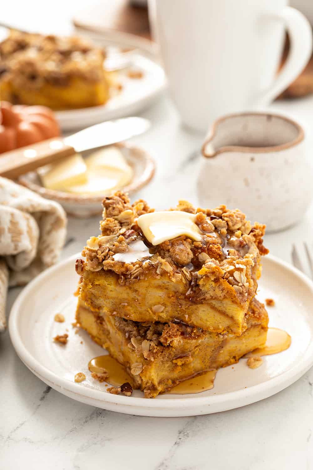 https://www.mybakingaddiction.com/wp-content/uploads/2021/11/stacked-slices-pumpkin-french-toast.jpg