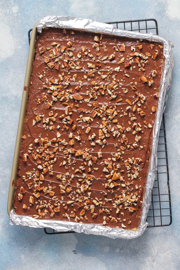 Assembled saltine toffee in a foil-lined sheet pan