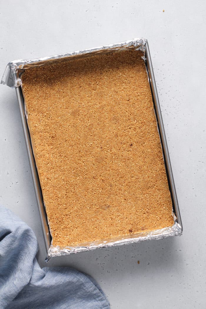 Graham cracker crust in the bottom of a 13x9-inch pan