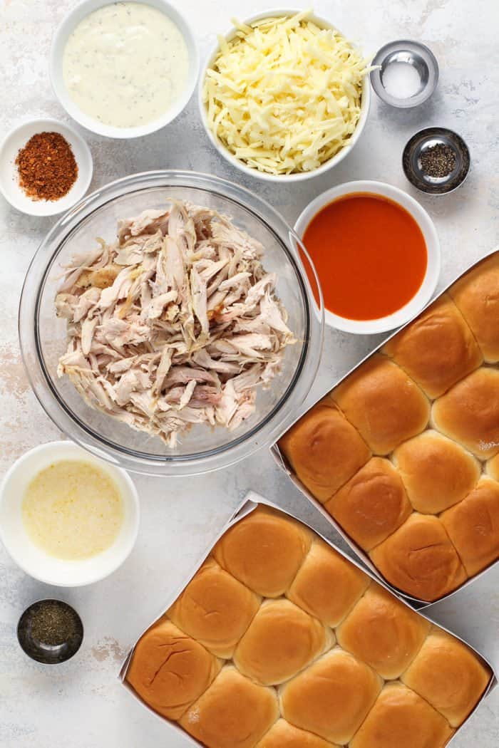 Buffalo chicken slider ingredients arranged on a countertop