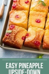 slices of pineapple upside down cake set on a sheet pan. Text overlay includes recipe name.