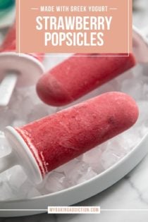Close up of a strawberry popsicle set on top of ice cubes in a white bowl. Text overlay includes recipe name.