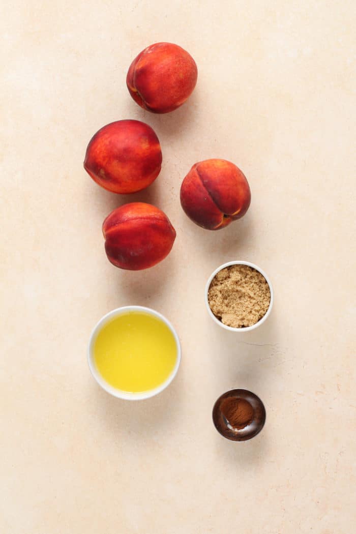 Ingredients for grilled peaches on a countertop.