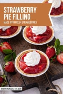 Mini strawberry pies in graham cracker crusts topped with whipped cream. Text overlay includes recipe name.