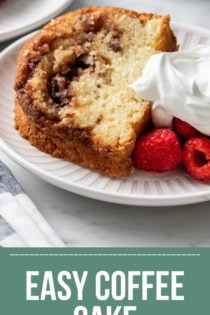 Slice of coffee cake next to fresh berries and whipped cream on a white plate. Text overlay includes recipe name.