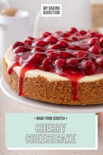 Whole cherry cheesecake set on a cake stand on a countertop. Text overlay includes recipe name.