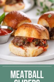 Close up of a meatball slider on a white plate with more sliders in the background. Text overlay includes recipe name.