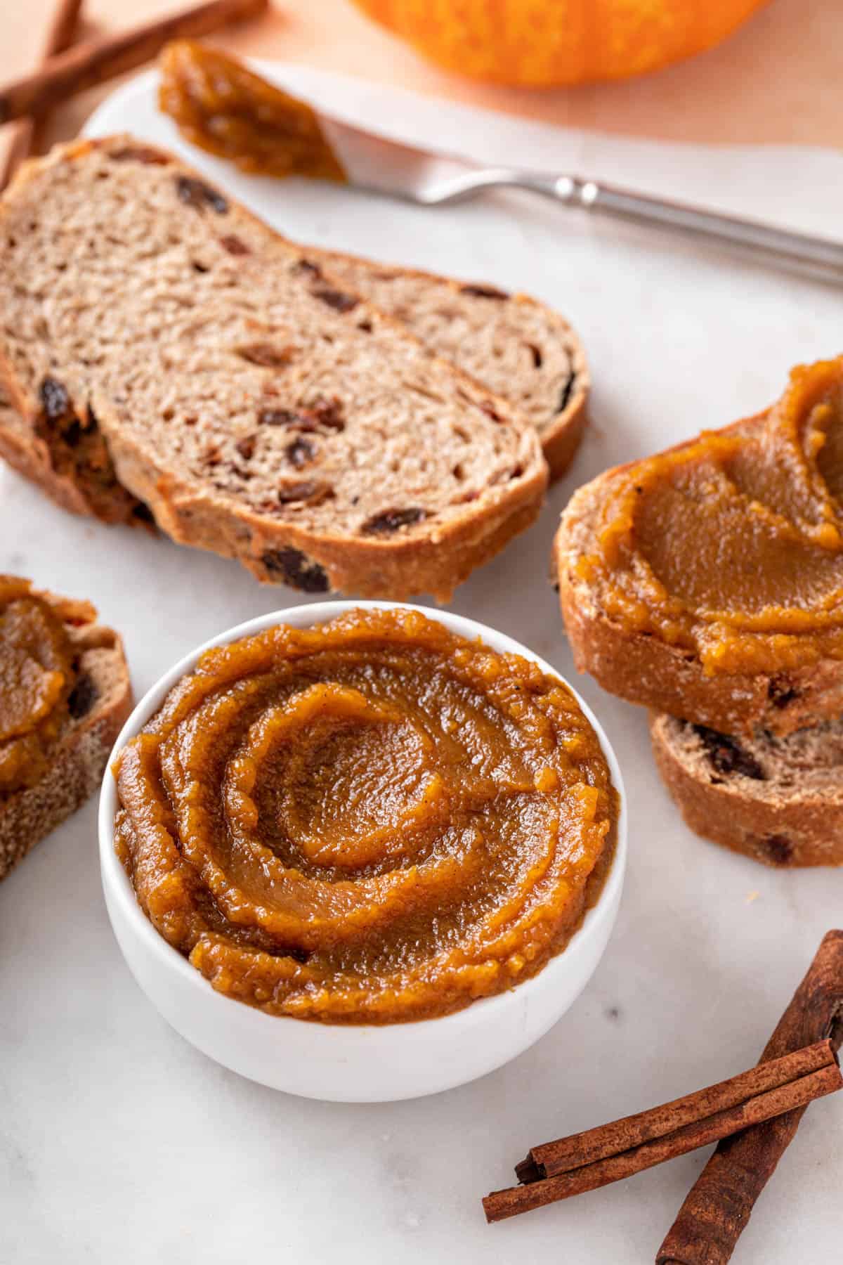 a white bowl of pumpkin butter