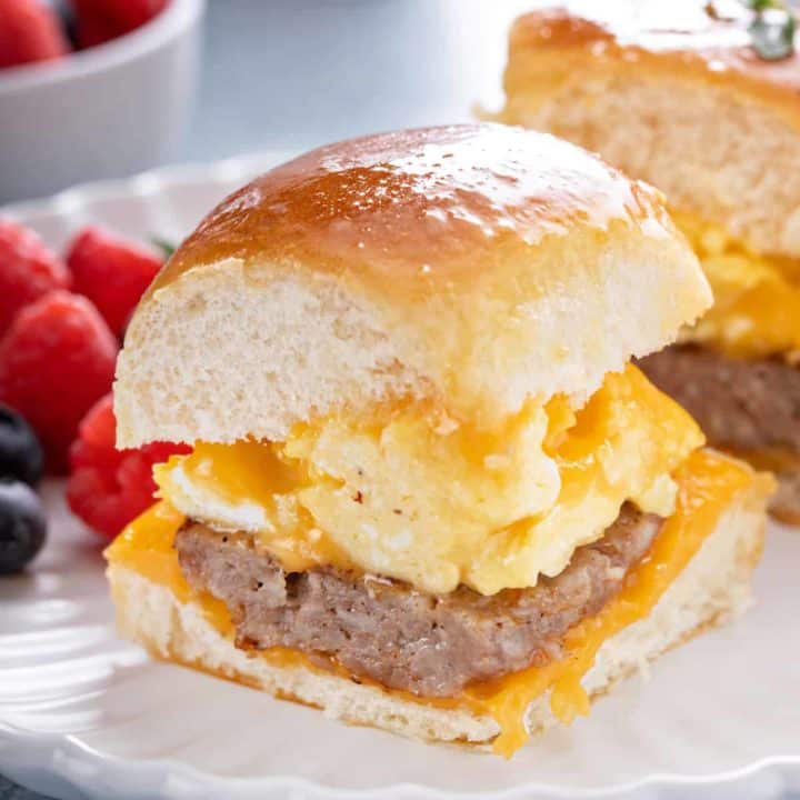 Close up of breakfast slider on a white plate.