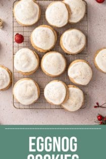 Overhead view of iced eggnog cookies on a wire cooling rack. Text overlay includes recipe name.